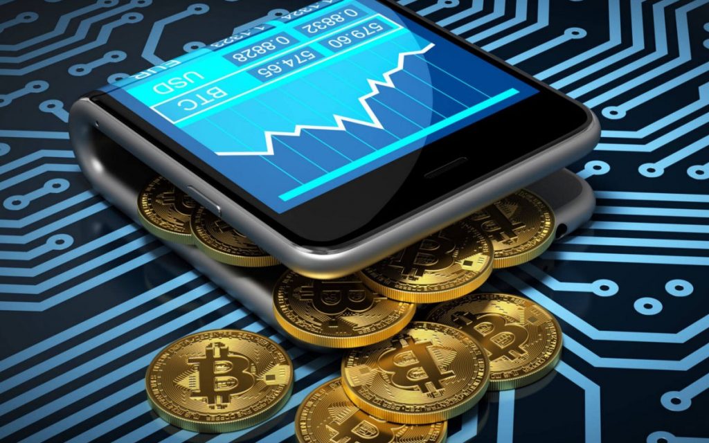 celular doblado con bitcoins representando una wallet